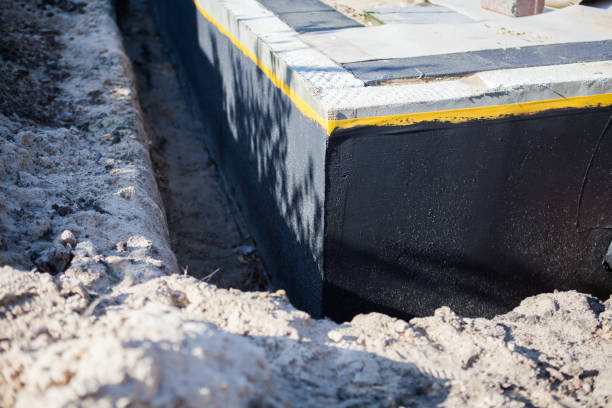 Professional Waterproofing technician working in Iselin, NJ